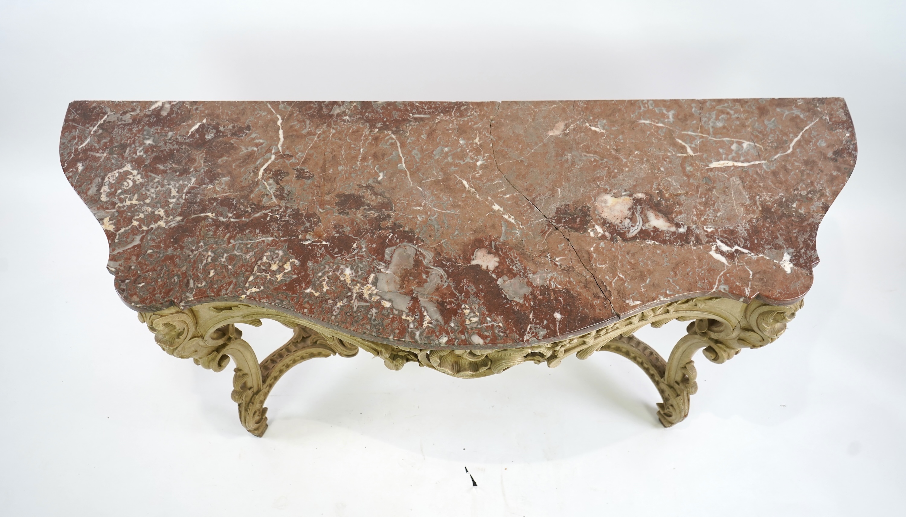 A 19th century Louis XV style marble topped painted serpentine console table